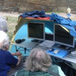 Tutor and students at the ERA base location viewing the video feed and communicating via VoIP with the field geologist. Howick, Friday 07 August 2009