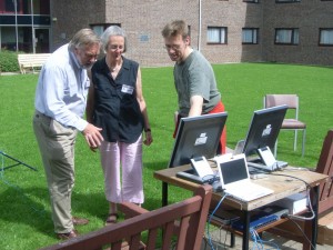 Mark demonstrating the ERA system to Bob and Di, tutors for students with additional requirements at the OU geology residential school
